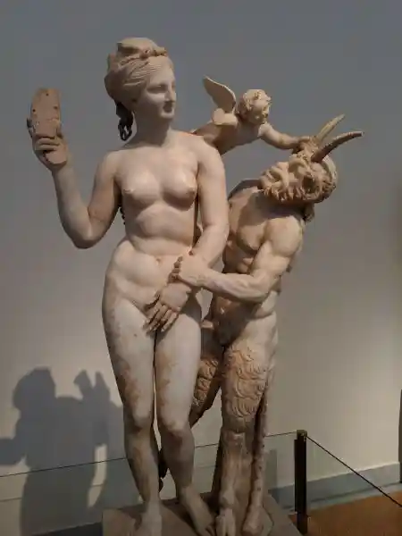 Famous Hellenistic marble sculpture known as the Group of Aphrodite, Pan and Eros, also nicknamed the "Slipper Slapper".